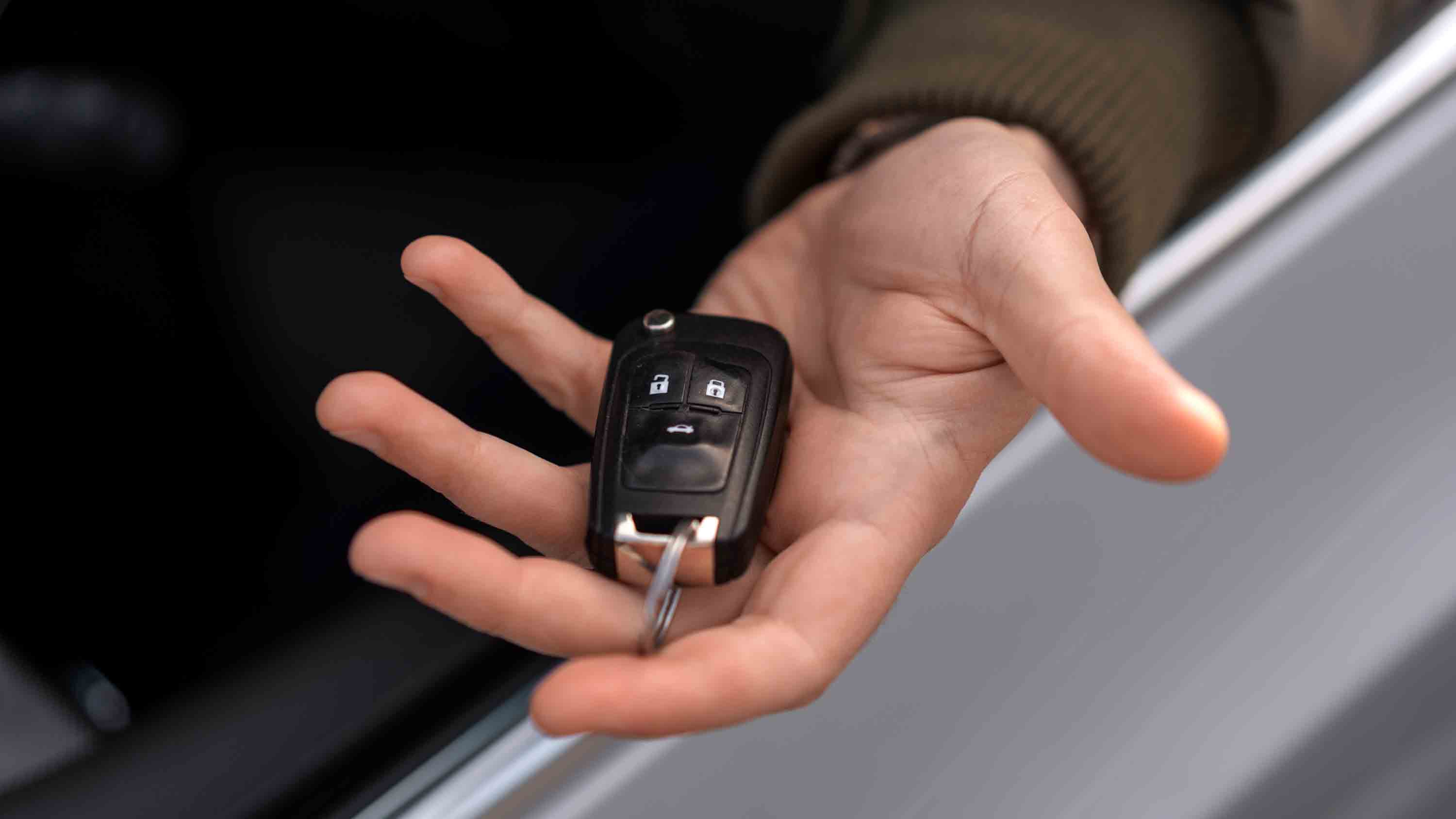 high-angle-hand-holding-car-key_modified.jpg